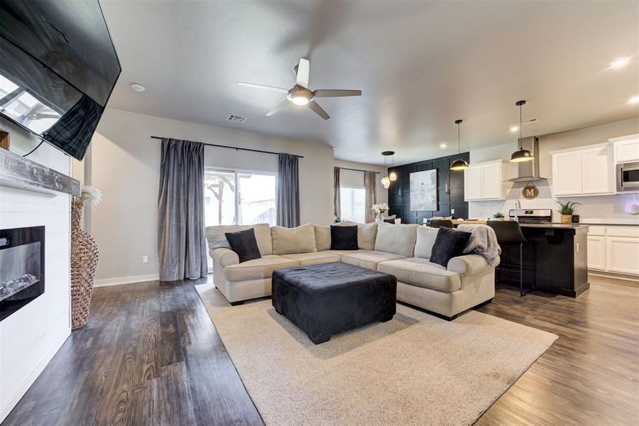 Open-concept living room with fireplace